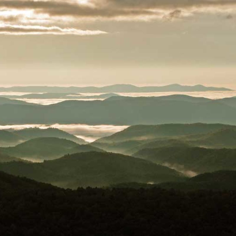 Row upon row of foggy ridges are visible at Thunder Hill, NC in the Parkway's Highlands region.