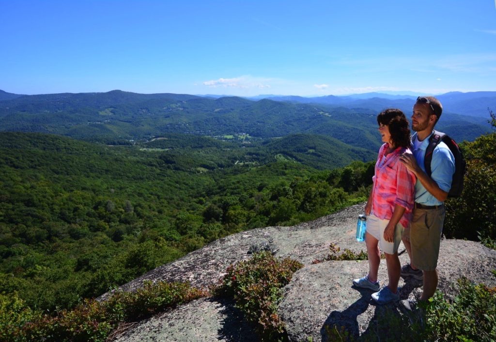 two people admire the view from Beech Mountain, North Carolina