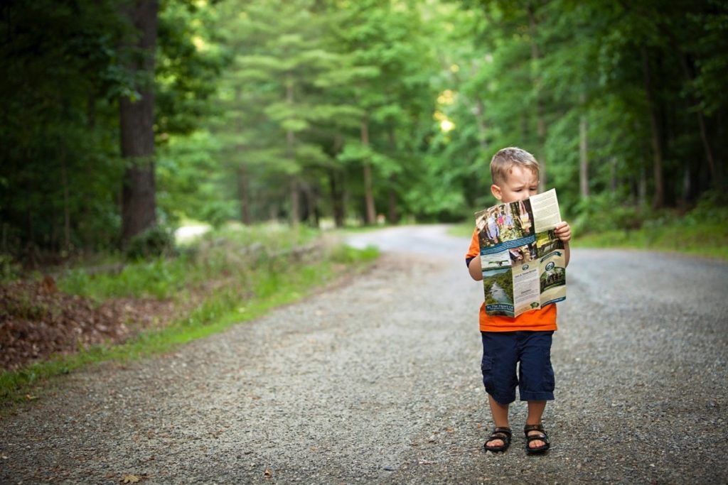 Boy holding a map