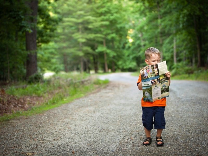 Boy holding a map