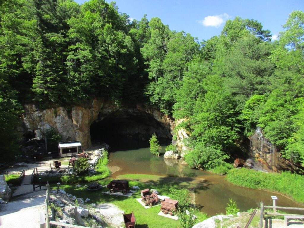 Emerald Village showcases antique mining equipment and multiple displays.