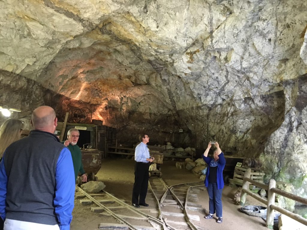 Train tracks and mining equipment are still present in a mine at Emerald Village.