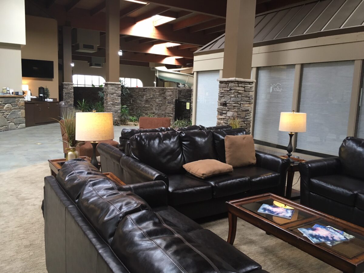 Cozy couches fill the lobby at the Cascades Mountain Resort in Hendersonville.