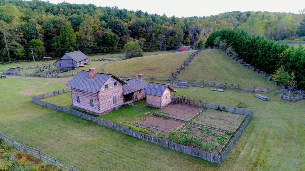 Blue Ridge Farm Museum offers a view of a historic farmstead including structures and gardens.