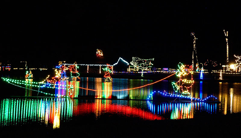 A nighttime light display reflects on the water in Winchester, Virginia.