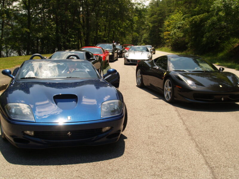 Two rows of Ferraris are parked in an overlook on the Foothills Parkway in Tennessee.