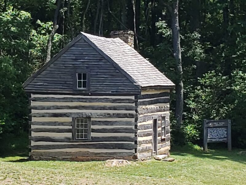 Polly Woods hosted early travelers in her single story log home near the Peaks of Otter Lodge.