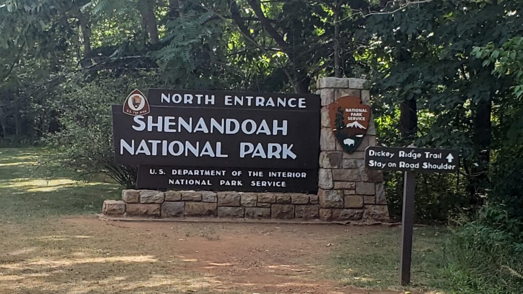 The brown entrance sign at the north end of Shenandoah National Park at Front Royal.