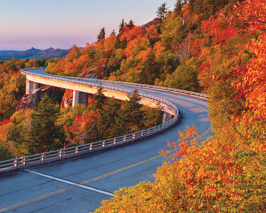 Blue Ridge Parkway winding through a bright autumn day