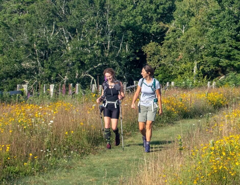 two people hike an accessible trail found along the blue ridge parkway
