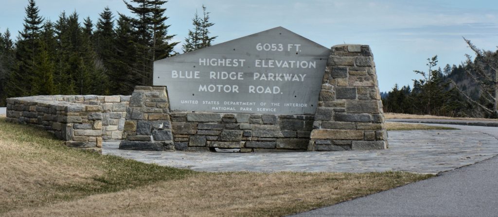 a sign at the entrance of a blue ridge parkway attraction