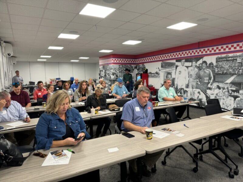 a room full of blue ridge parkway association members seated at tables in rows